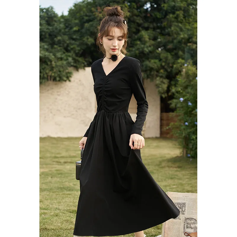 Elegant Black Knitted Smocked V-neck A-line Midi Dress